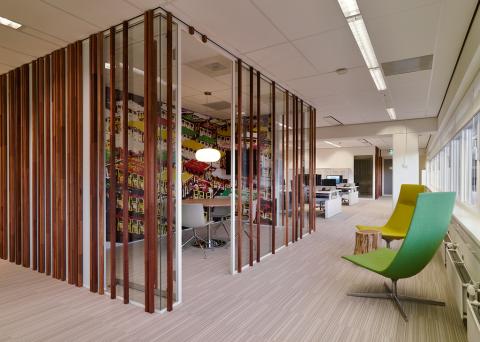 Wood construction on the glass of a office partition