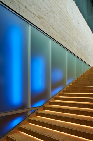Blue light behind the IQ-Single glass wall at Pulse Delft