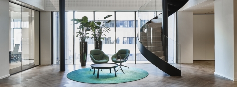 iQ Protect glass partitions with chairs and staircase