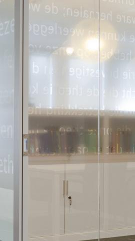 Closeup text design foil on glass wall