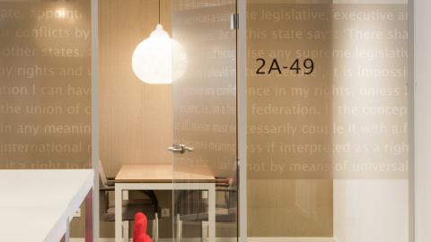 Full glass partitions wall with text design film added
