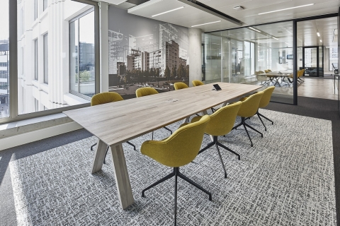 Meeting room with double glass partition at BDO Eindhoven