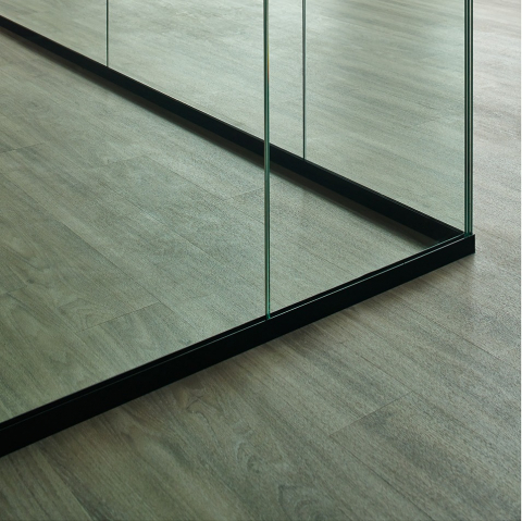 Corner detail from a QQ1 freestanding glass office