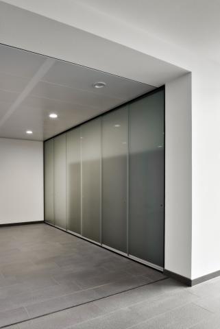 Hardened glass sliding doors to coverup the vending machines at OTCkmar