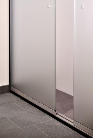 Hardened glass sliding doors to coverup the vending machines at OTCkmar