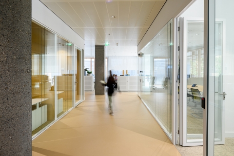 Double glass partitions with wall thick doors.